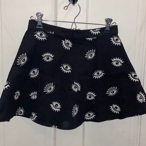 All seeing eye black mini skirt